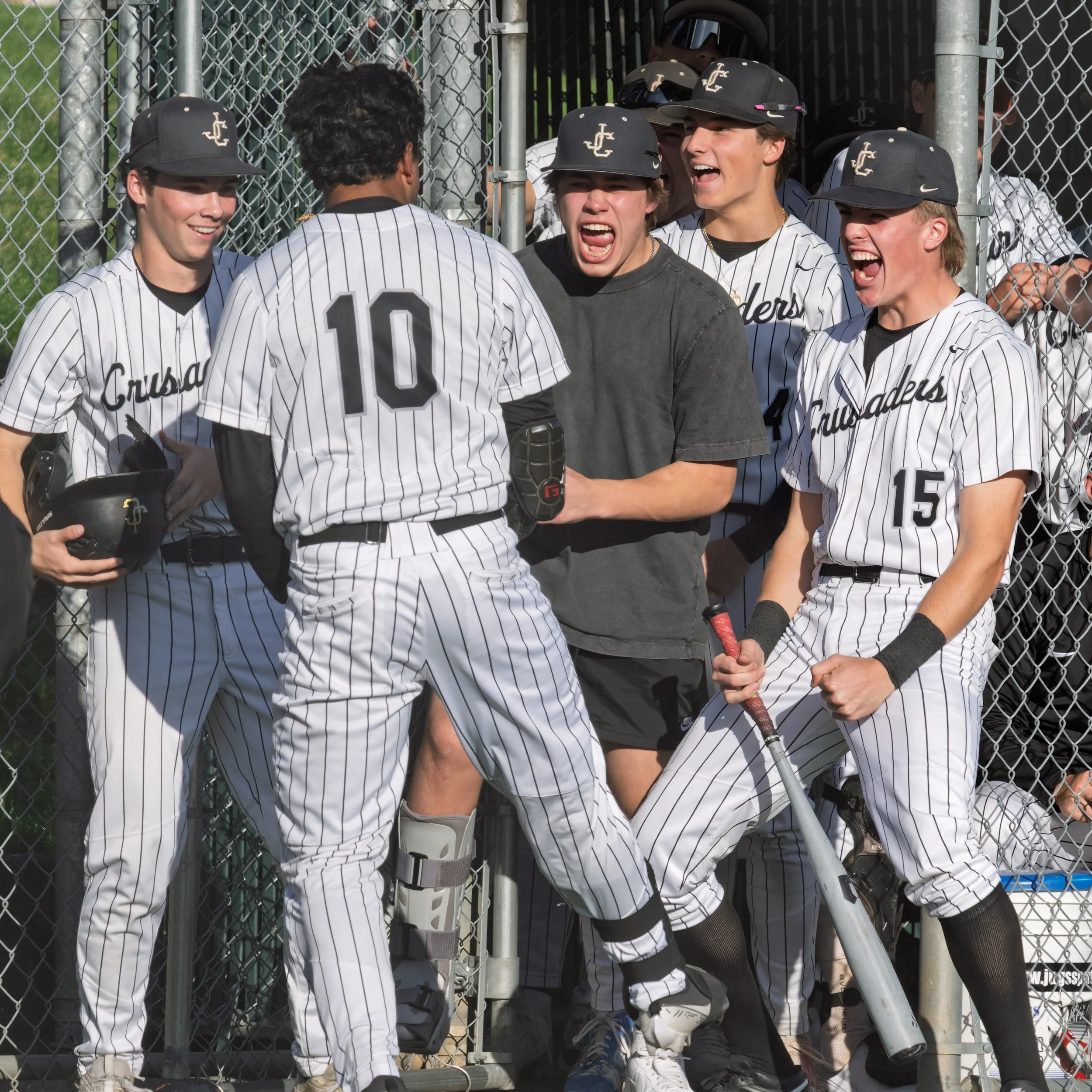 Jesuit varsity baseball in-game action against Lincoln