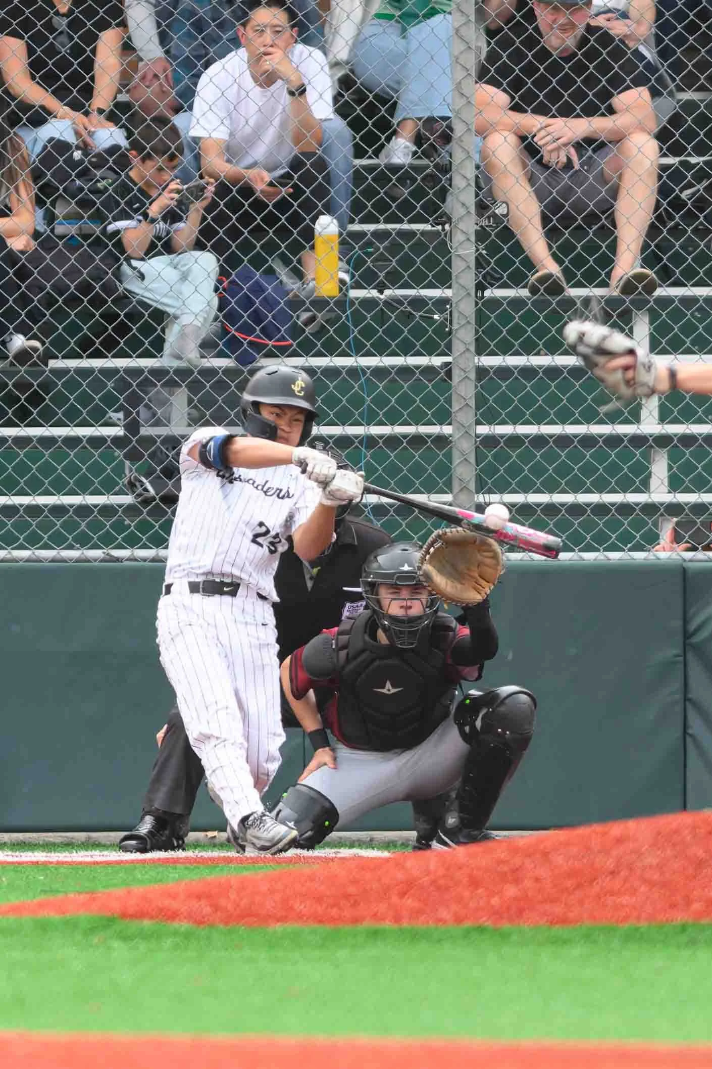 Jesuit vs Tualatin game action, April 2026