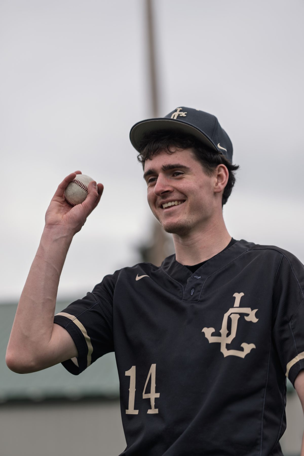 Athlete portrait with baseball, Sportraiture session